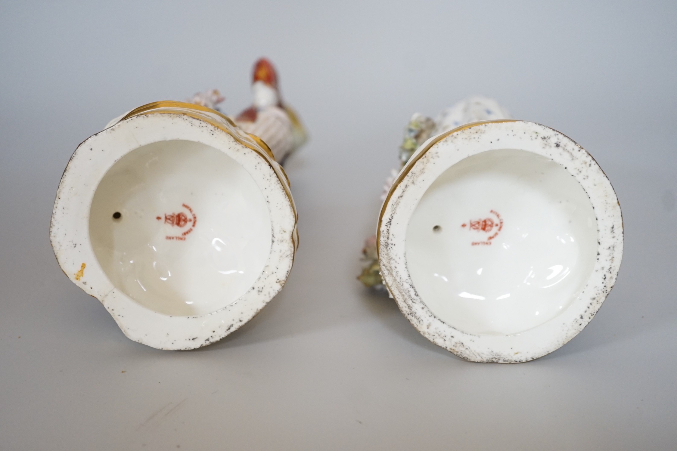 A pair of Royal Crown Derby figures of a Shepherd and shepherdess, 23cm